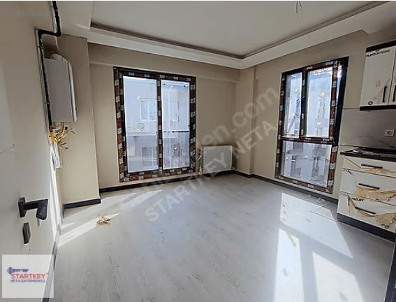 Hürriyet Mahallesi'nde İzban"a 5 dk Sıfır bina Satılık Daire 2+1