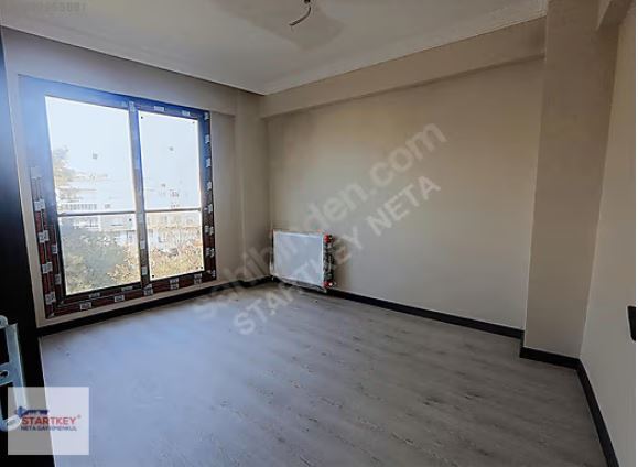 Hürriyet Mahallesi'nde İzban"a 5 dk Sıfır bina Satılık Daire 2+1